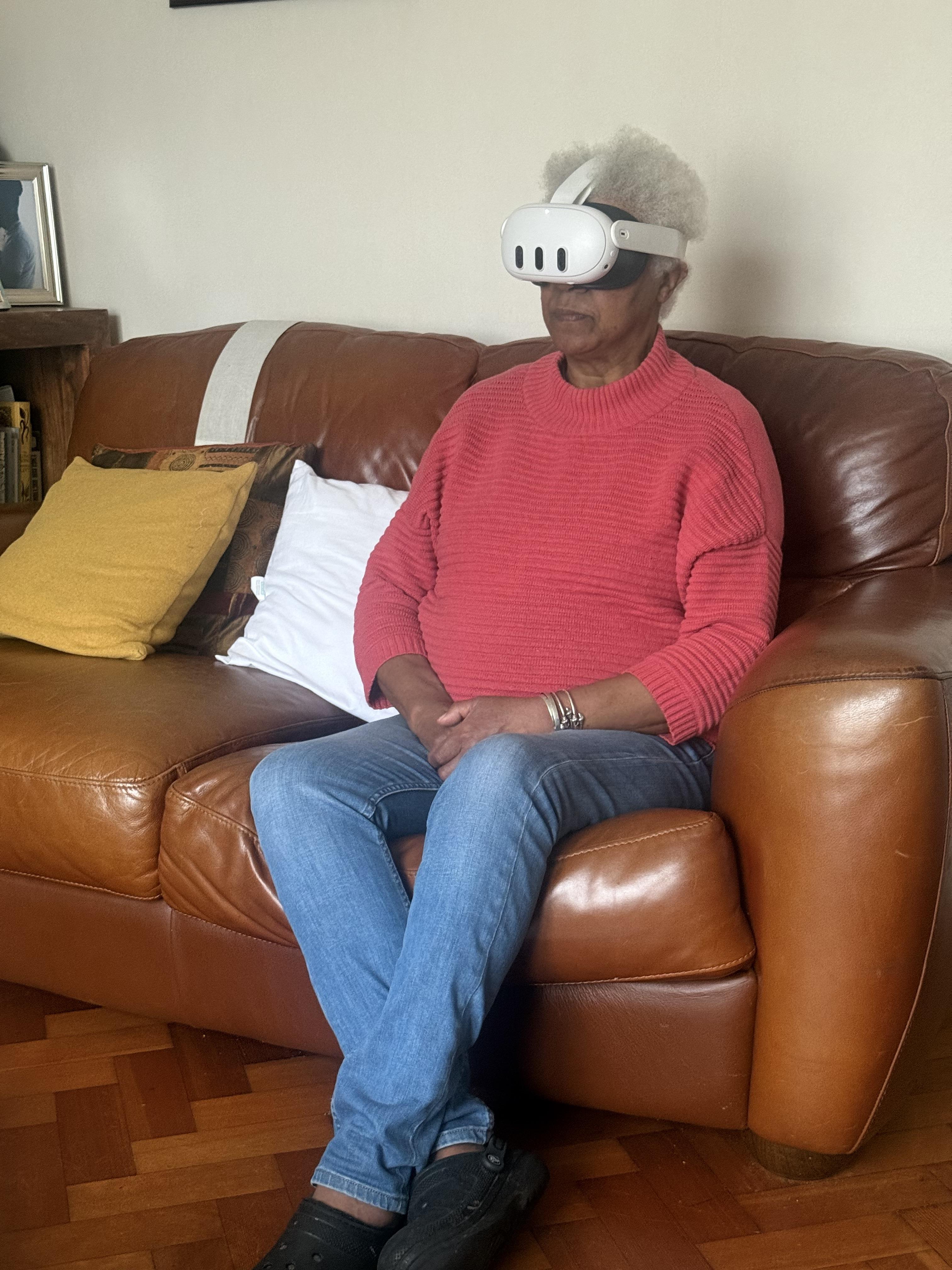 Elder woman using VR headset